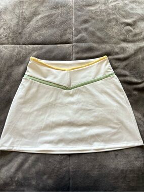 New Balance Staud Collab White Skort with Yellow, Pink, and Green Trim